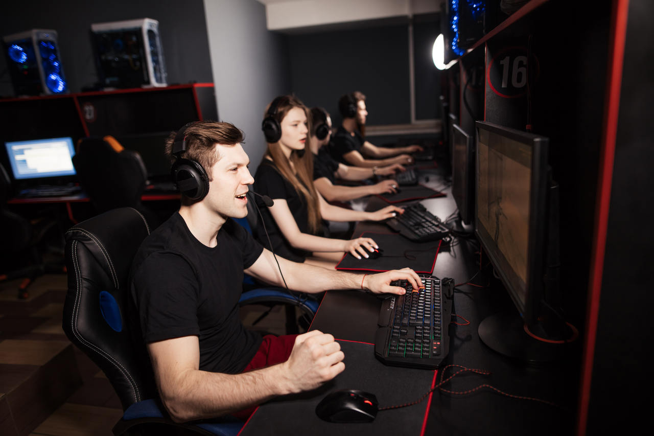 Gaming group. Gamers Group. Геймер. Stock image of Group of Gamers. Gaming website.